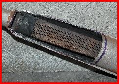 Fantic Exhaust that has been opened and cleaned out.